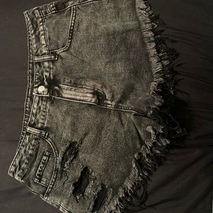 Frayed black jean shorts